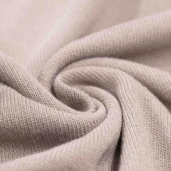 Tessuto A Maglia Per Bambini Di Cotone Beige Chiaro Tessuto A Maglia Per Bambini Di Cotone Beige Chiaro