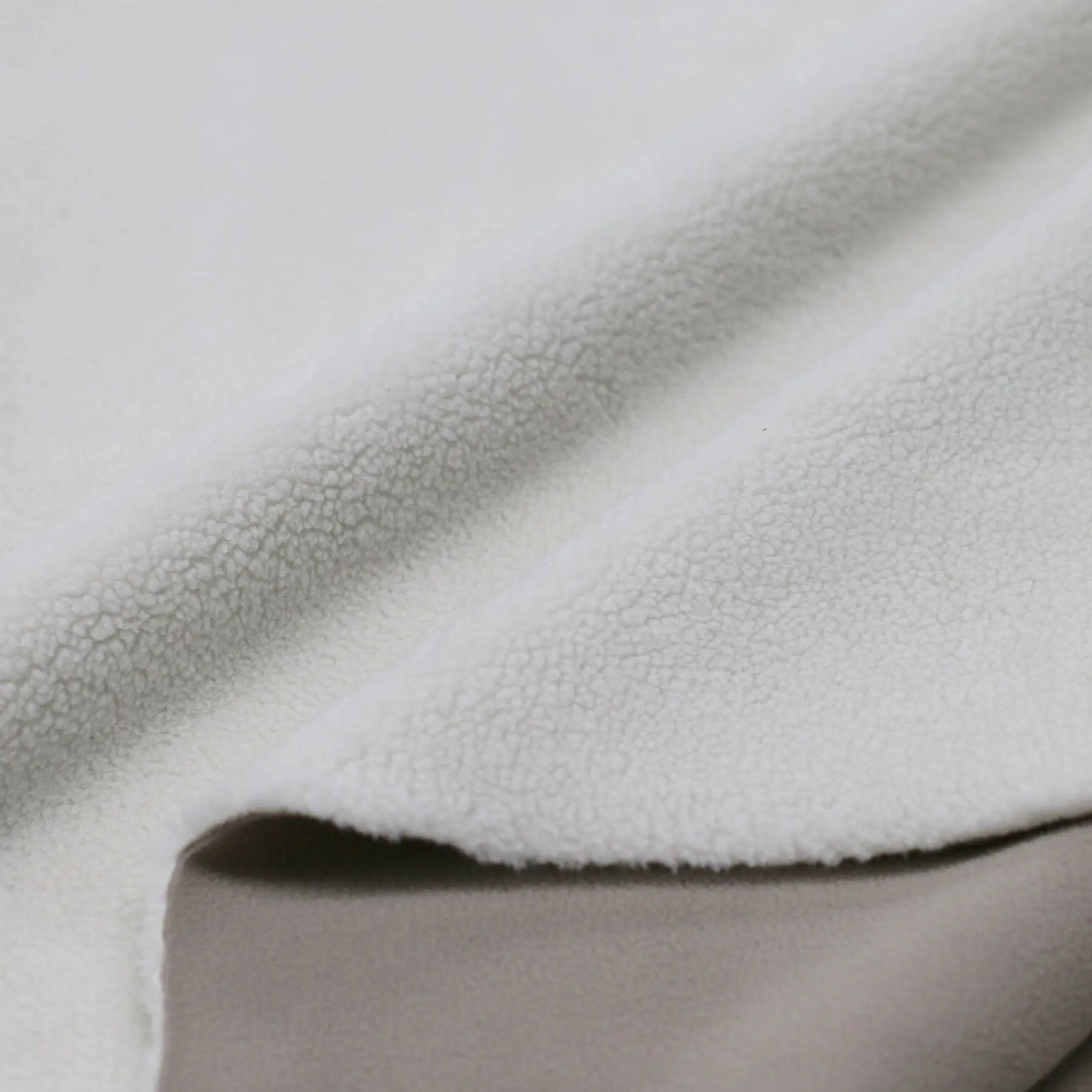 Teddy Fleece Doubleface Stof Wolwit / Donker Beige