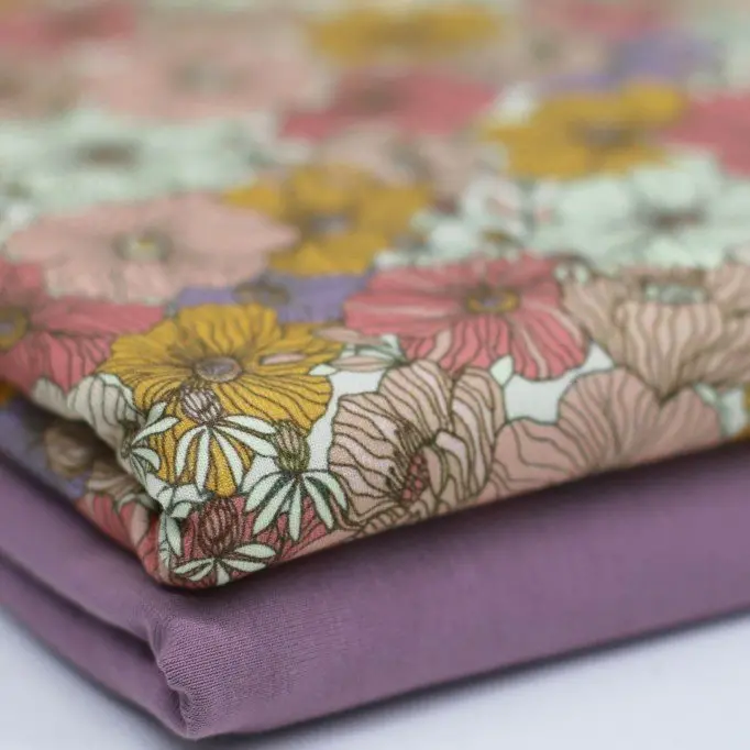 Bomuldjersey Digital Print - Blomsterblomst Lilla | Rijs Textiles Bomuldjersey Digital Print - Blomsterblomst Lilla - (Bomuldjersey Digitaltryk)