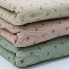 Rippstrick Jersey Stoff Bedruckt - Kleeblatt Sand Beige  Rippstrick Jersey Stoff Bedruckt - Kleeblatt Sand Beige