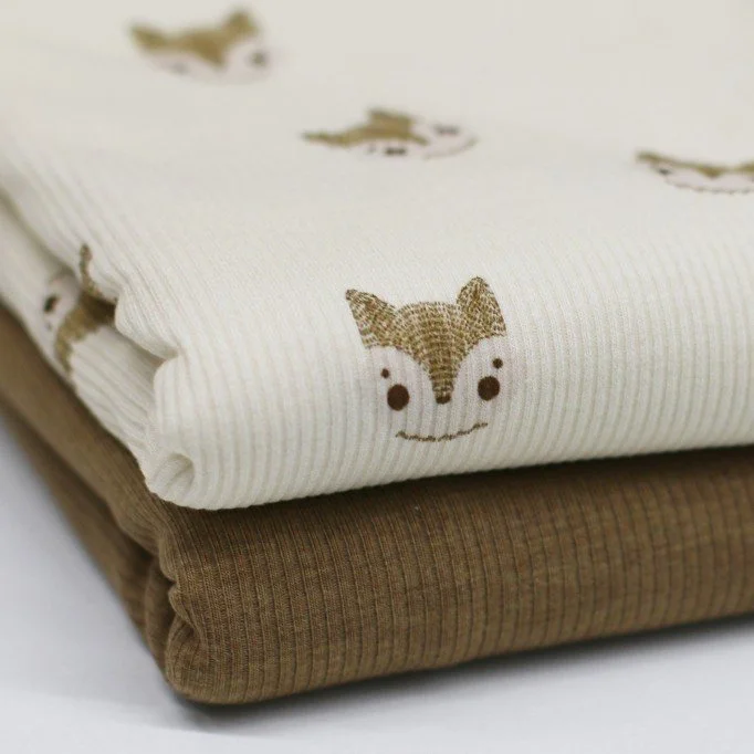 Tessuto Jersey Di Cotone Costine - Schizzi Volpi Beige Tessuto Jersey Di Cotone Costine - Schizzi Volpi Beige - (Jersey Tessuti)