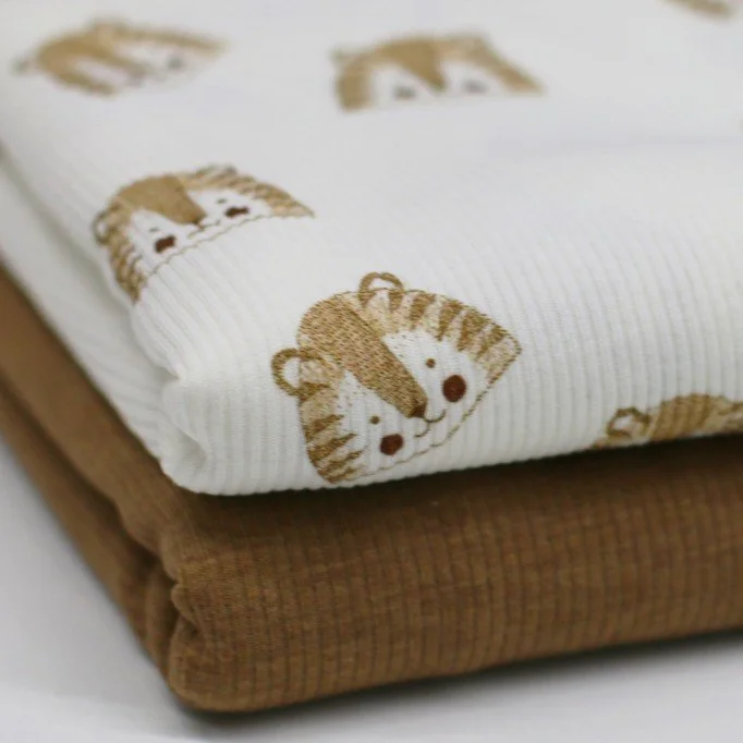 Tissu Maille Tricot Côtelé - Croquis Lions Écru Tissu Maille Tricot Côtelé - Croquis Lions Écru - (Tissus Jersey)