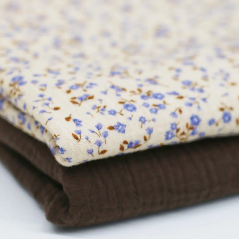 Baumwoll Musselin Stoff Digital - Blaue Miniblumen Baumwoll Musselin Stoff Digital - Blaue Miniblumen