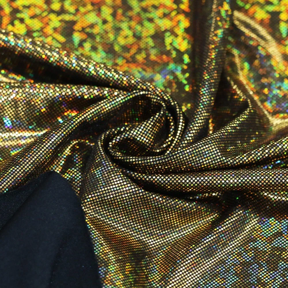 Hologram Lycra Stof (Spræng Glas) Sort / Guld Hologram Lycra Stof (Spræng Glas) Sort / Guld