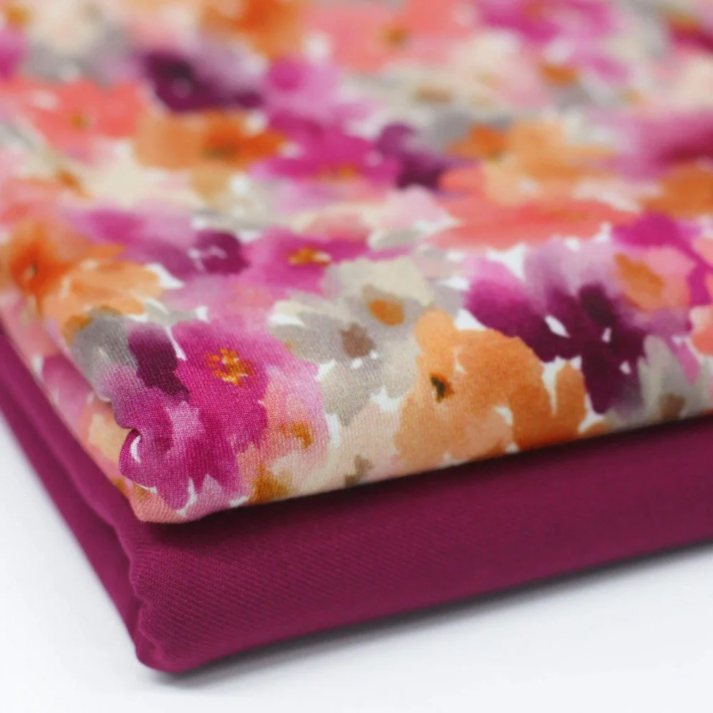 Digitale Print Bamboe Jersey - Vervaagde Bloem Fuchsia Oranje Digitale Print Bamboe Jersey - Vervaagde Bloem Fuchsia Oranje