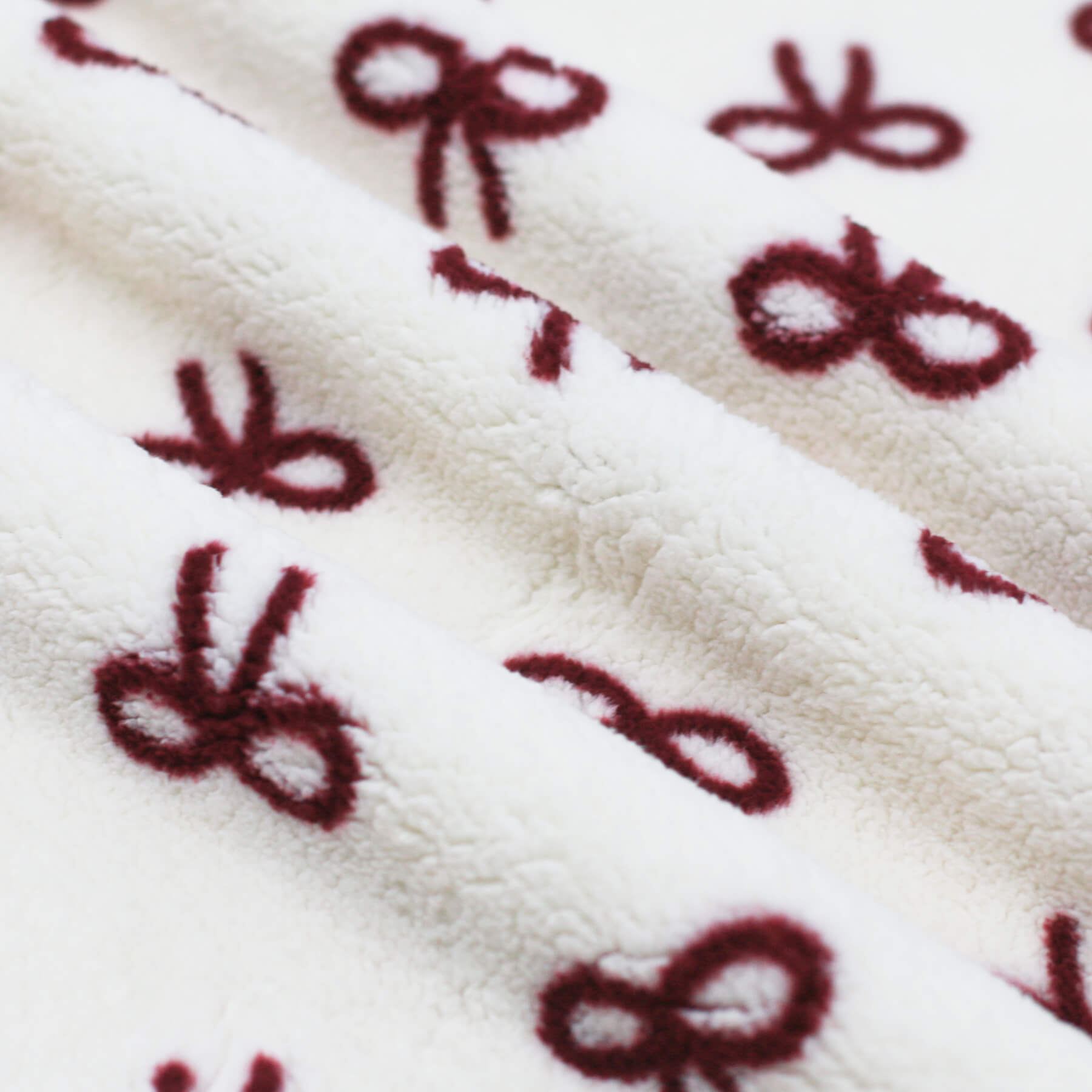 Teddy Stof Naturel Met Bordeaux Strik