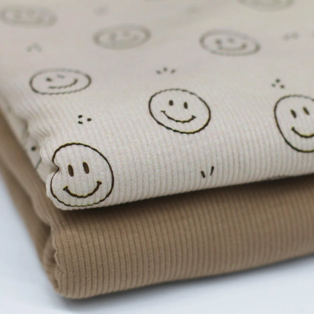 Rib Jersey Stof Bedrukt Smiley Donker Beige