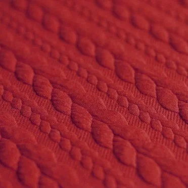 Cable knit jacquard fabric dark red per meter. Buy cheap online